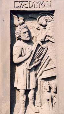 Святой Кедмон. Современный барьельф с памятника, установленного святому в Уитби