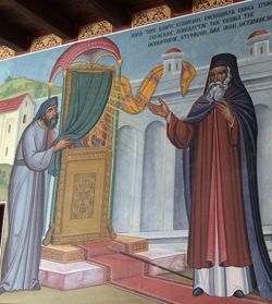 Свт. Герасим II (Паллада́с) Александрийский, ослепленный светом от Киккской иконы Божией Матери. 1989 г. (Морошан М. и Г.). Роспись галереи. Киккский монастырь, остров Кипр.